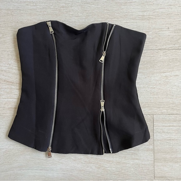 Black strapless zipper top. Size XS. NWOT. Perfect condition. - Picture 2 of 7